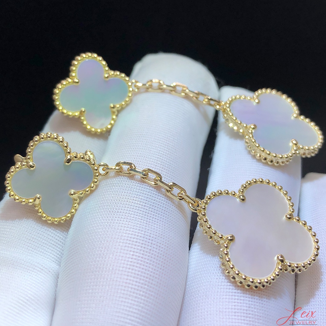 VCA Magic Alhambra 2 Motifs White Mother-of-peral 18k Yellow Gold Drop Earrings (1) VCA Magic Alhambra 2 Motifs White Mother-of-peral 18k Yellow Gold Drop Earrings