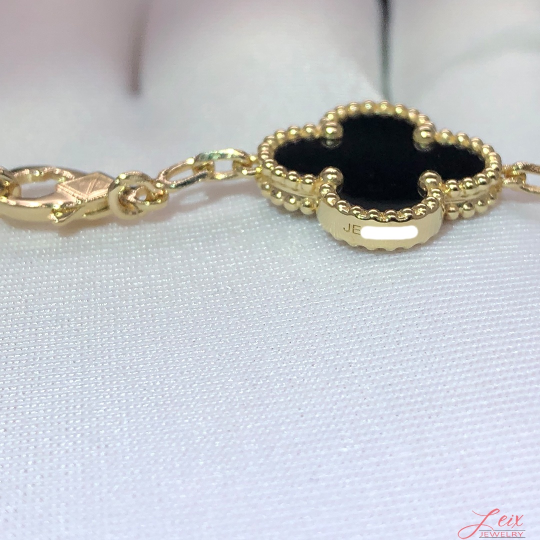 Van Cleef & Arpels 18k Yellow Gold & Onyx Vintage Alhambra 20 Motifs Long Necklace (2) Van Cleef & Arpels 18k Yellow Gold & Onyx Vintage Alhambra 20 Motifs Long Necklace