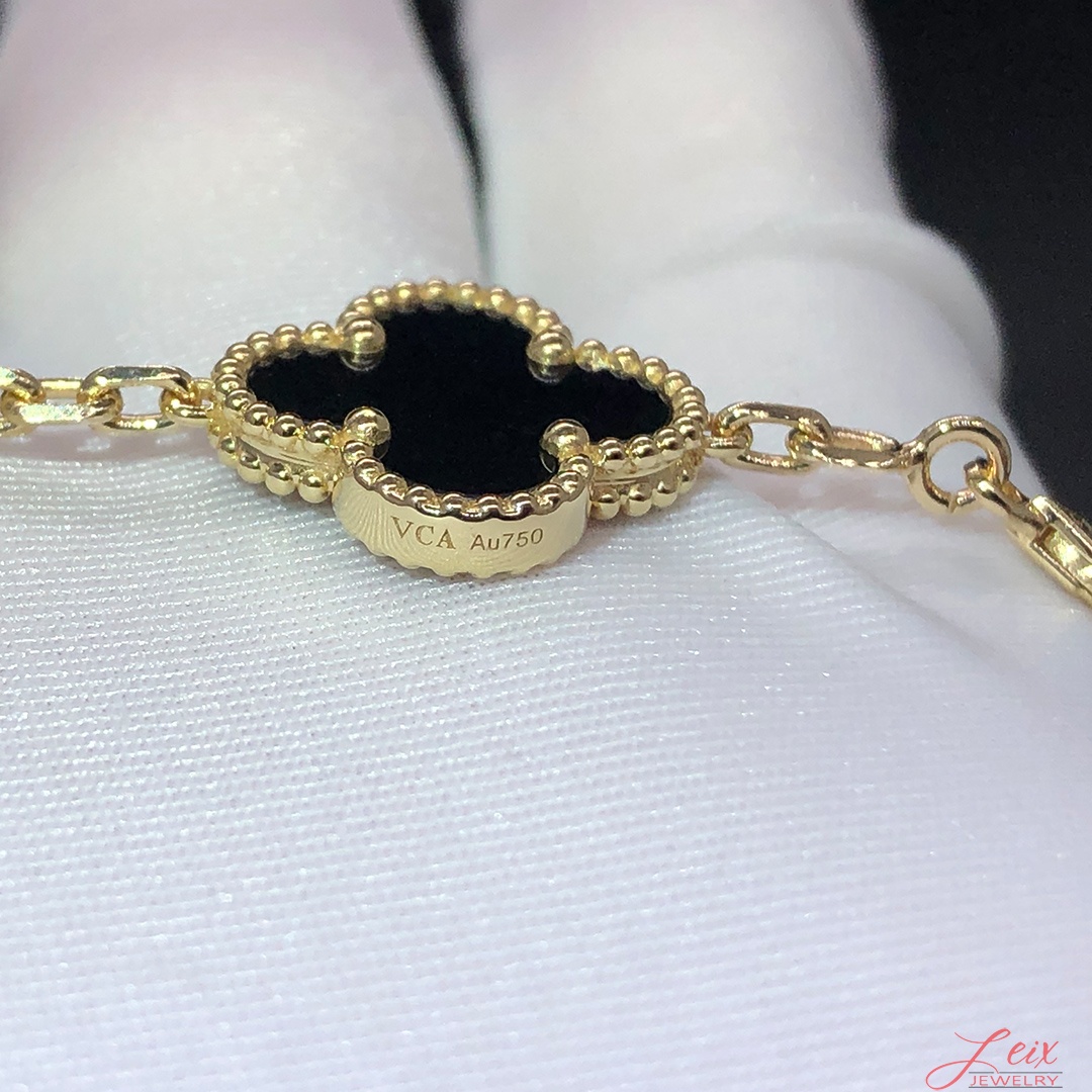 Van Cleef & Arpels 18k Yellow Gold & Onyx Vintage Alhambra 20 Motifs Long Necklace (3) Van Cleef & Arpels 18k Yellow Gold & Onyx Vintage Alhambra 20 Motifs Long Necklace