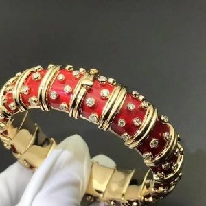 Tiffany & Co. Schlumberger 18K Yellow Gold Red Enamel and 9.87ct Diamond Bangle Bracelet
