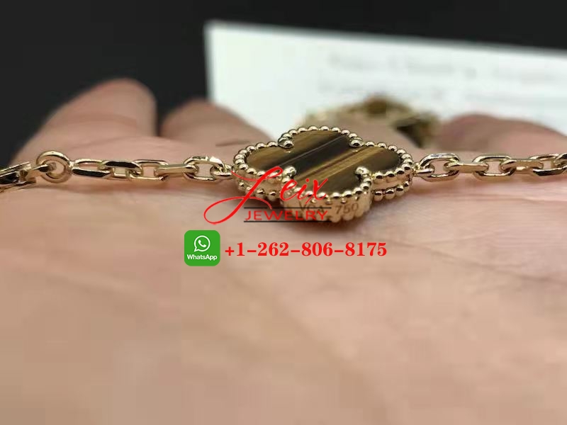 Van Cleef 18K Yellow Gold 20 Motifs Tiger's Eye Vintage Alhambra Long Necklace (3) Van Cleef 18K Yellow Gold 20 Motifs Tiger's Eye Vintage Alhambra Long Necklace