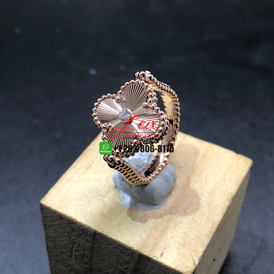 Van Cleef & Arpels 18K Rose Gold Guilloché and Carnelian Vintage Alhambra Reversible Ring (2) Van Cleef & Arpels 18K Rose Gold Guilloché and Carnelian Vintage Alhambra Reversible Ring