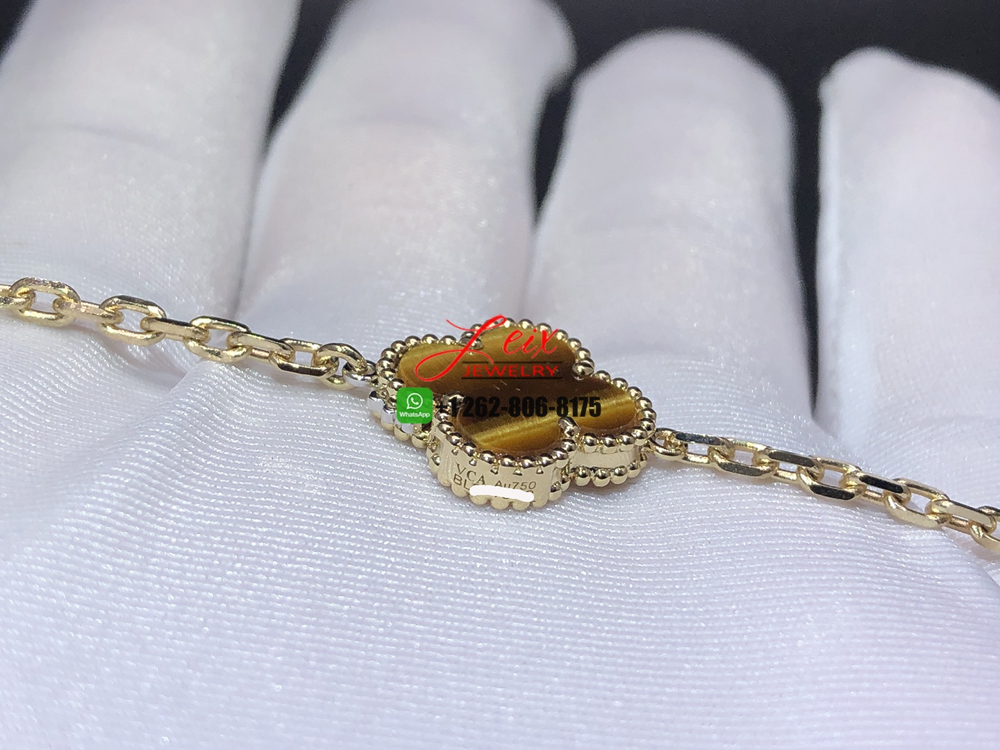 Van Cleef & Arpels Magic Alhambra Tiger's Eye 18k Yellow Gold 16 Motifs Long Necklace (1) Van Cleef & Arpels Magic Alhambra Tiger's Eye 18k Yellow Gold 16 Motifs Long Necklace