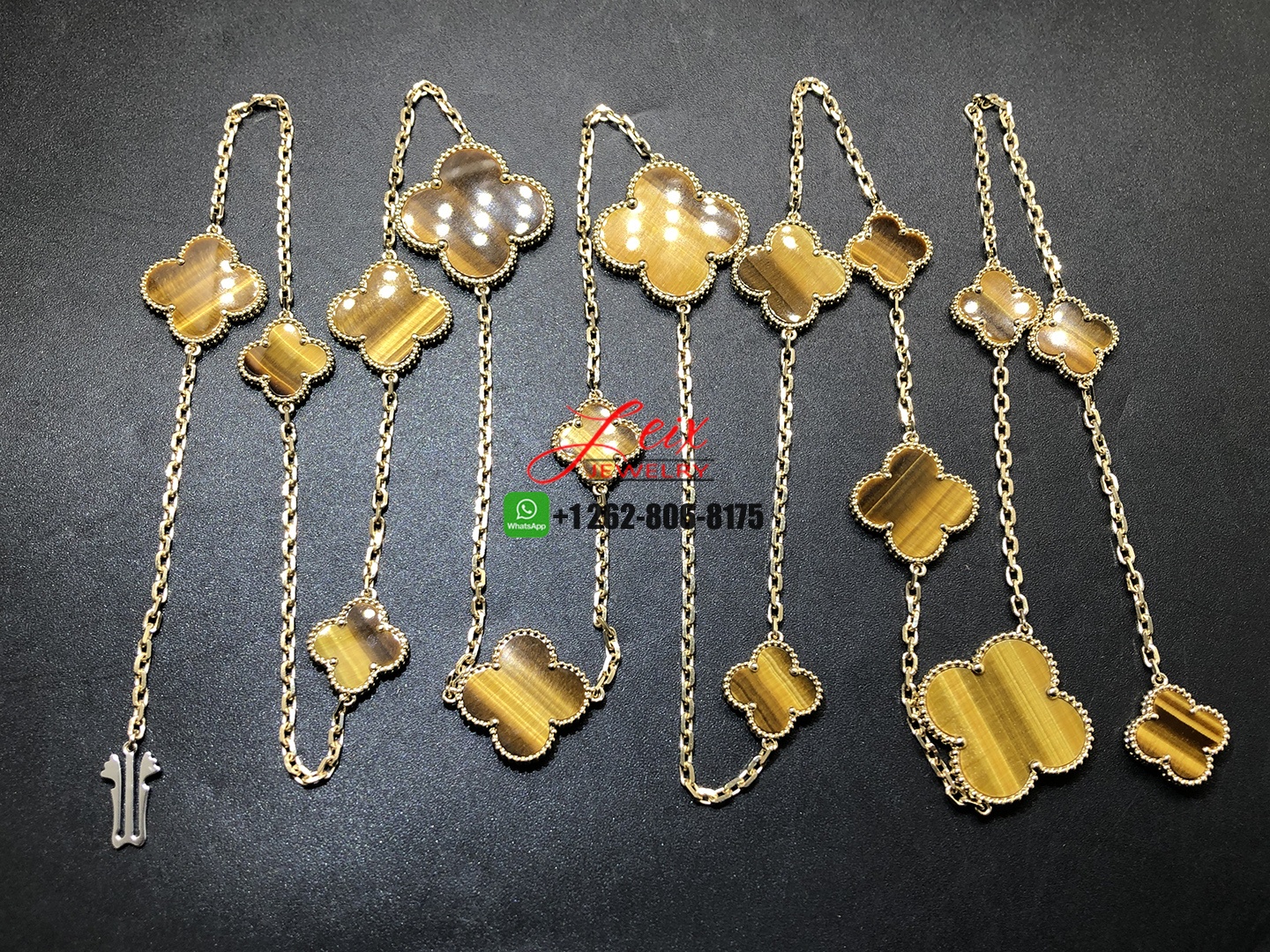 Van Cleef & Arpels Magic Alhambra Tiger's Eye 18k Yellow Gold 16 Motifs Long Necklace (2) Van Cleef & Arpels Magic Alhambra Tiger's Eye 18k Yellow Gold 16 Motifs Long Necklace