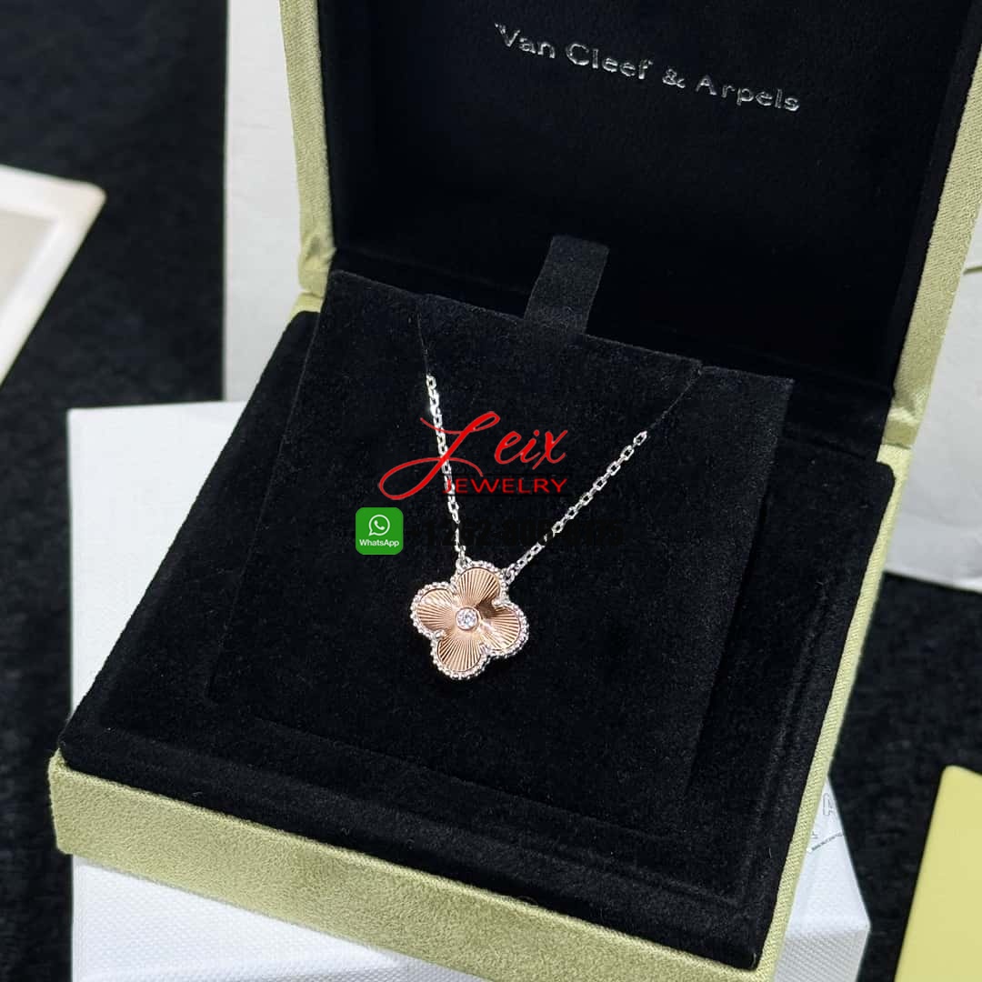 Van Cleef & Arpels Vintage Alhambra Guilloche Gold Diamond 2024 Holiday Pendant Necklace (8) Van Cleef & Arpels Vintage Alhambra Guilloche Gold Diamond 2024 Holiday Pendant Necklace